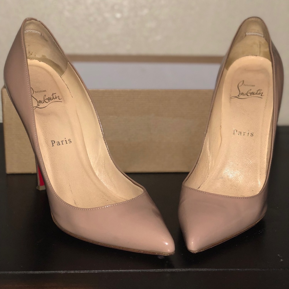 Nude Christian Louboutin Pigalle heels.